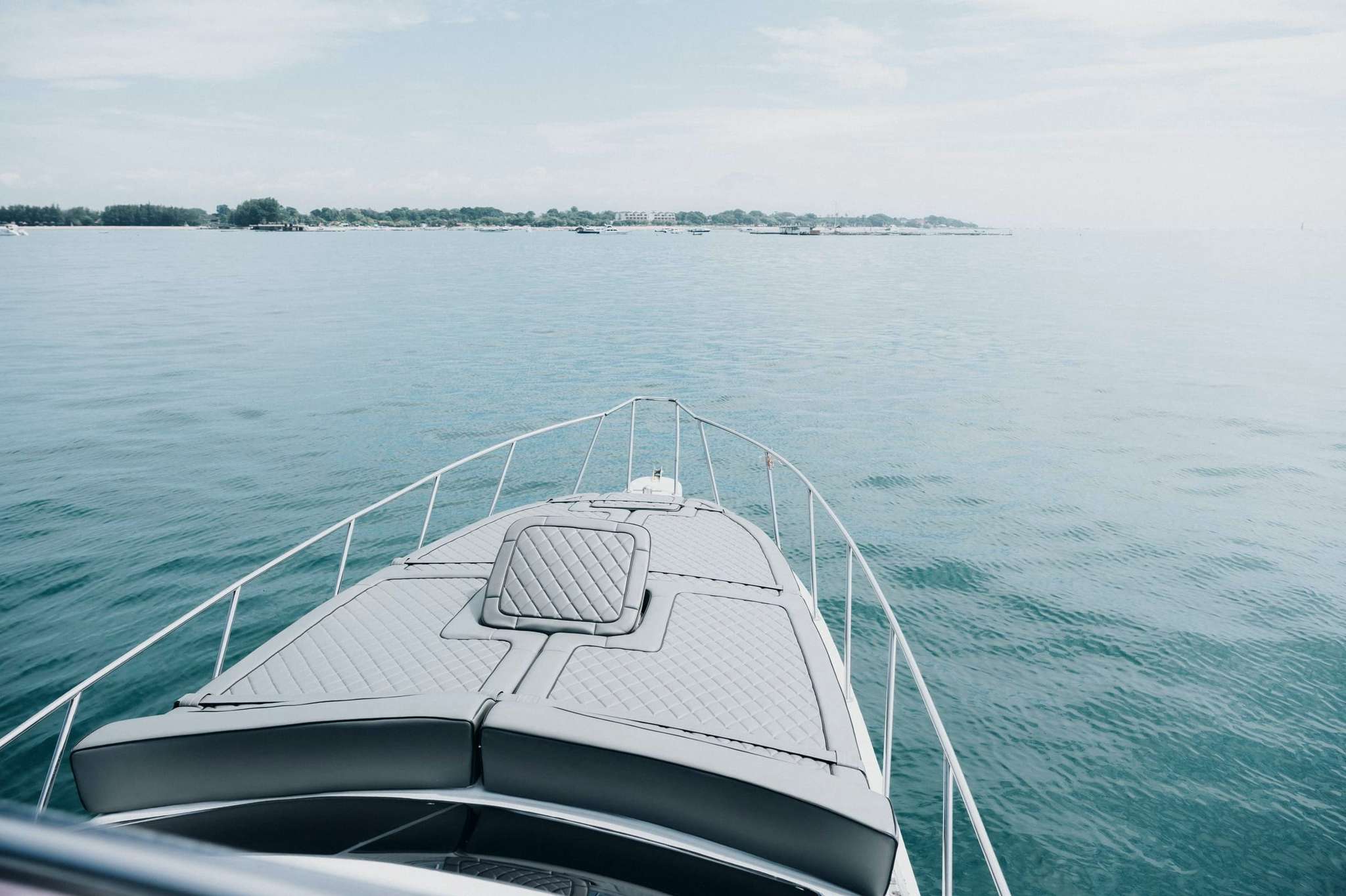 Bow view looking out over the ocean from Freedom Yacht