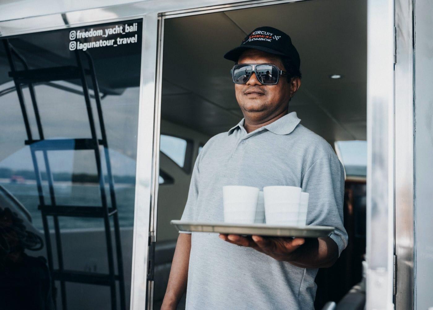 Snack station and drinks set up on the deck of a yacht in Bali